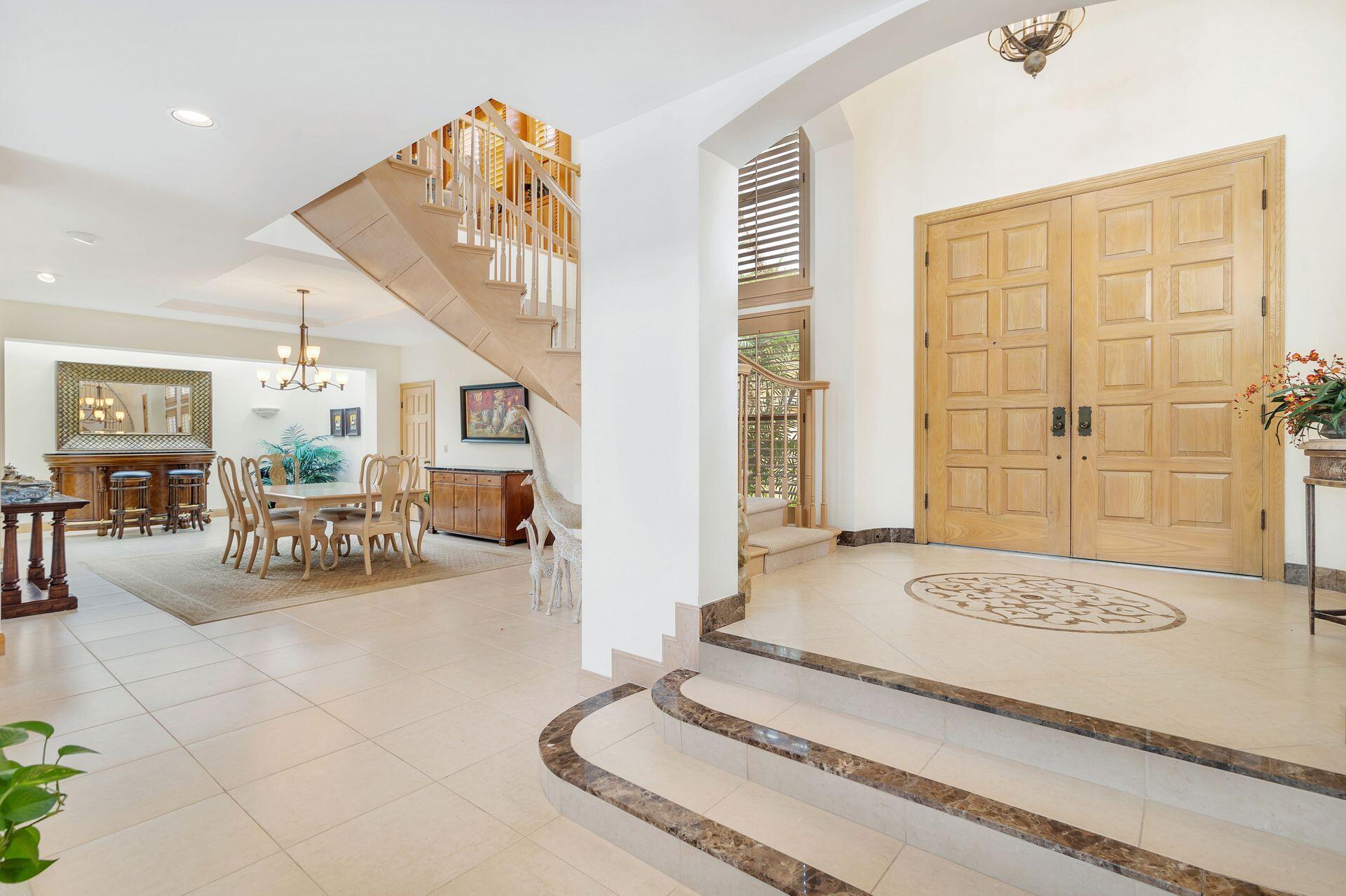 3330 Bridgegate Drive Jupiter, FL 33477 - Photo 5 of 39 a living room with furniture and a table