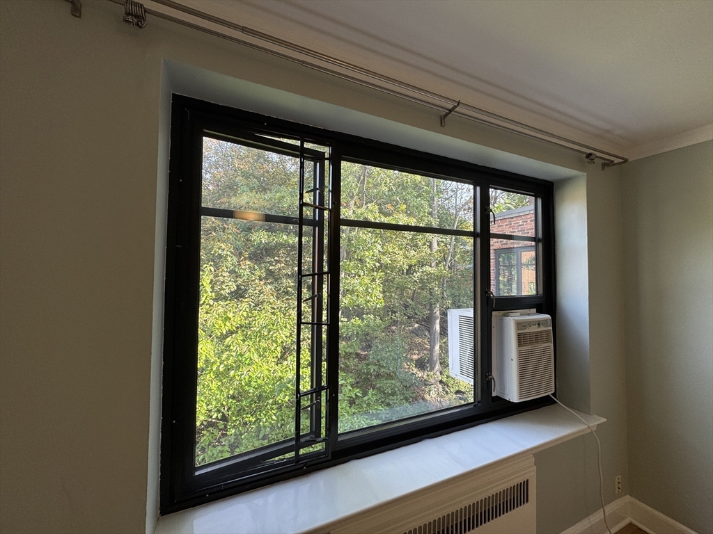 65 Strathmore Road, Unit 49 Boston, MA 02135 - Photo 13 of 26 a view of a room that has a large window
