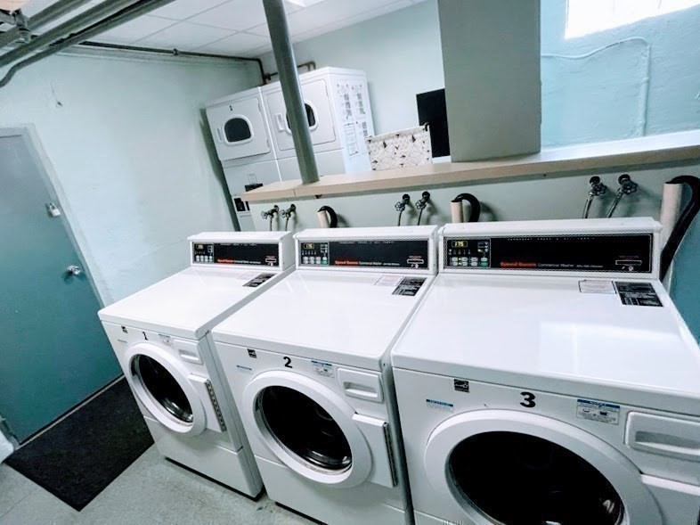 65 Strathmore Road, Unit 49 Boston, MA 02135 - Photo 24 of 26 a utility room with dryer and washer