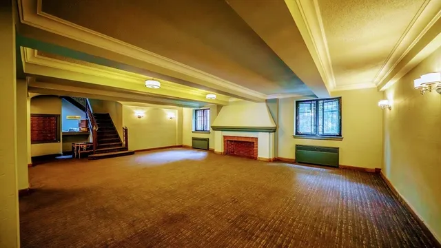 a view of roof deck with furniture