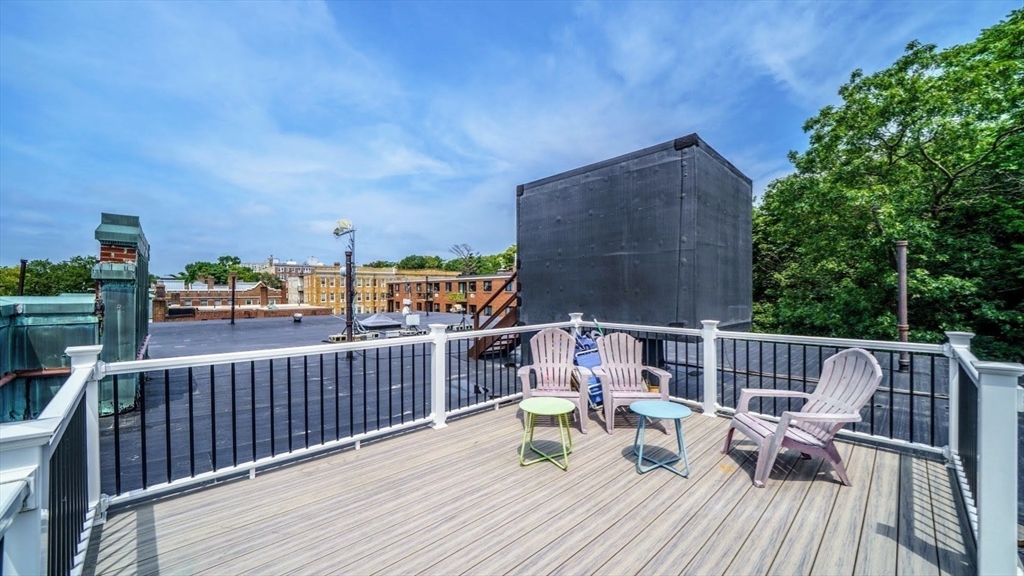 65 Strathmore Road, Unit 49 Boston, MA 02135 - Photo 26 of 26 a view of roof deck with furniture
