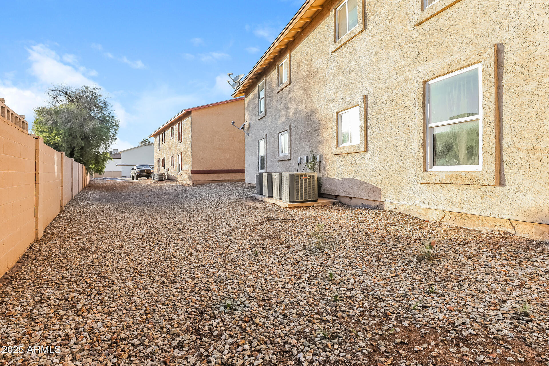 465 West Ivyglen Street, Unit 211 Mesa, AZ 85201 - Photo 14 of 16 a backyard of a house