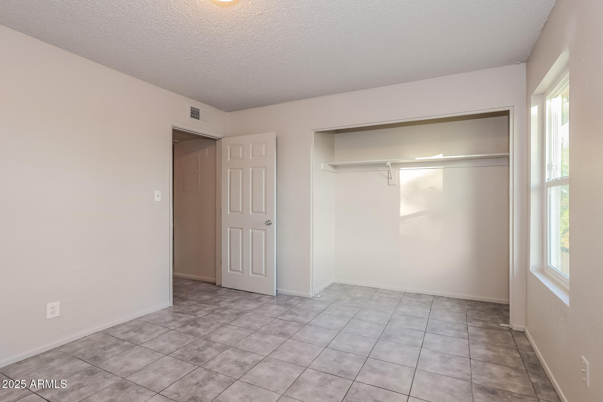 465 West Ivyglen Street, Unit 211 Mesa, AZ 85201 - Photo 9 of 16 a view of an empty room