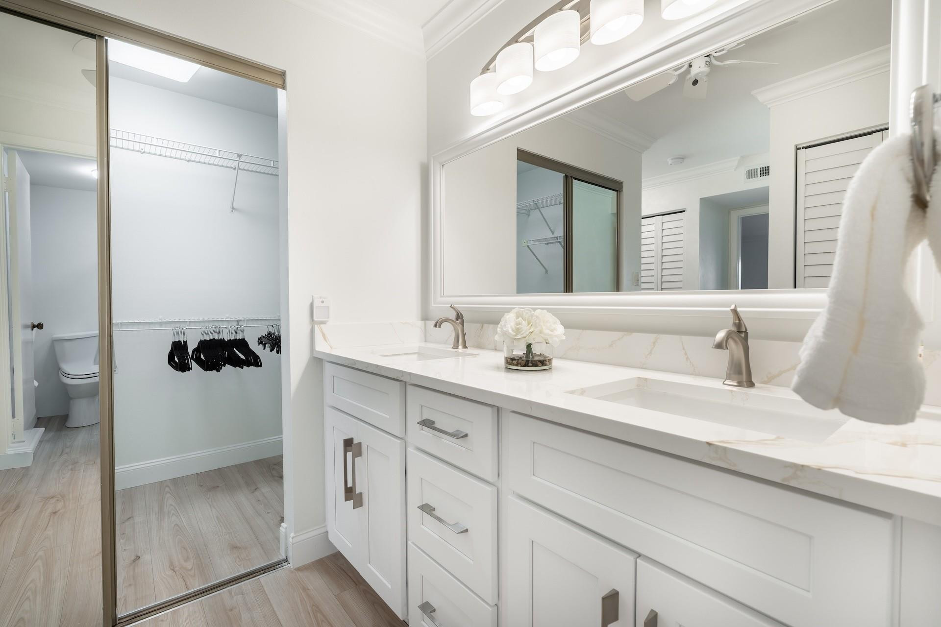 21668 Arriba Real, Unit 43A Boca Raton, FL 33433 - Photo 40 of 42 Main vanity and walk in closet