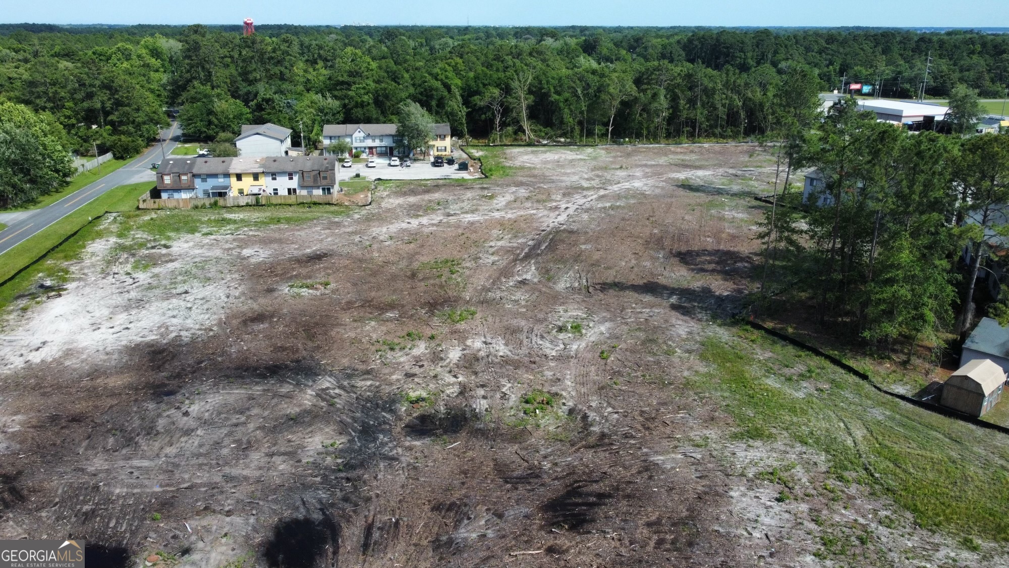 0 G - U Pelican Point Kings Bay, GA 31558 - Photo 14 of 19 a backyard of a house with table and chairs