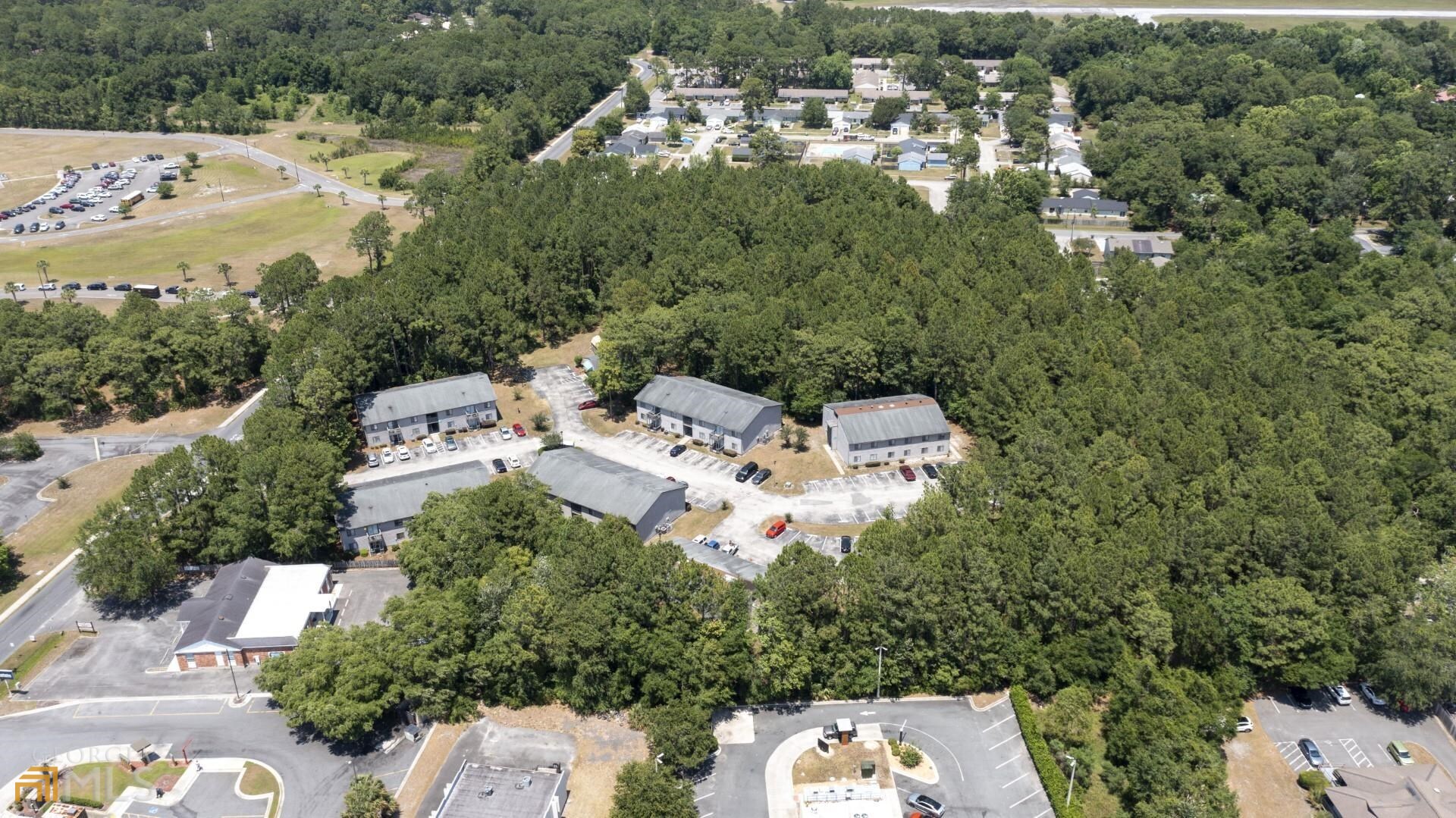 0 G - U Pelican Point Kings Bay, GA 31558 - Photo 4 of 19 an aerial view of a house with a yard