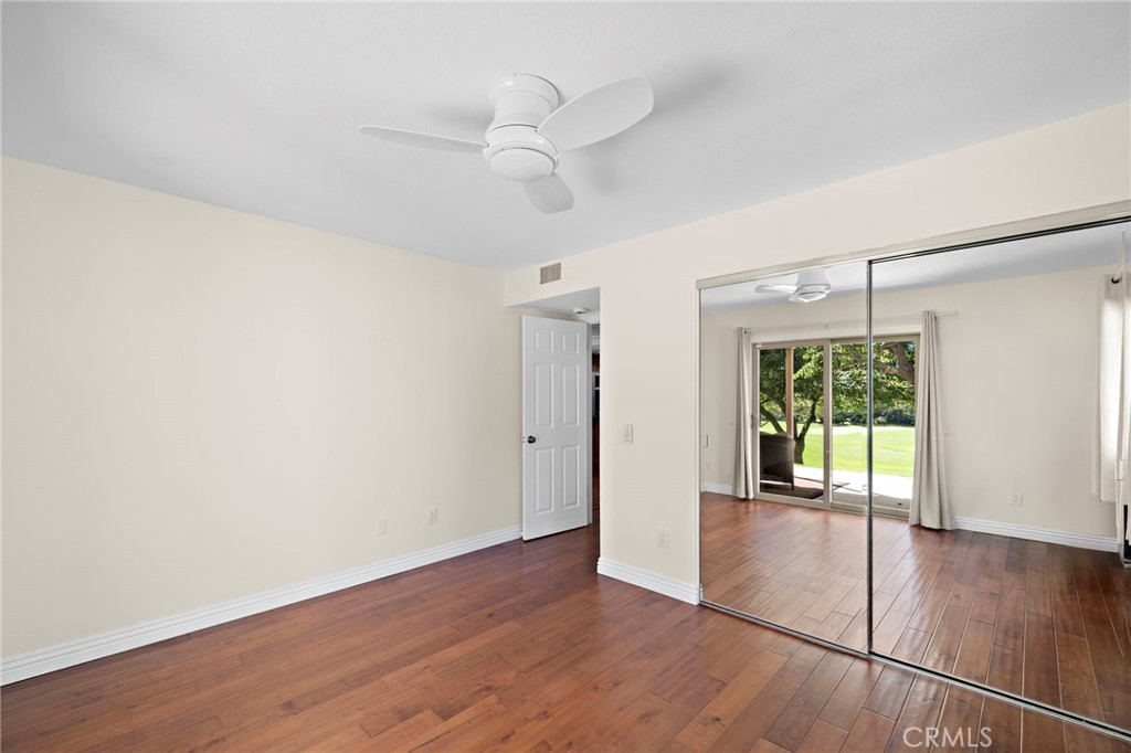 31654 West Nine Drive Laguna Niguel, CA 92677 - Photo 29 of 57 an empty room with wooden floor and windows
