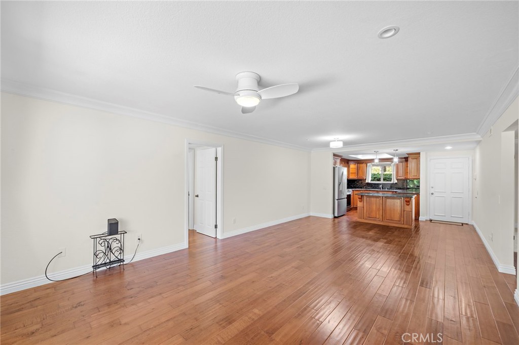 31654 West Nine Drive Laguna Niguel, CA 92677 - Photo 32 of 57 a view of an empty room with a window and wooden floor
