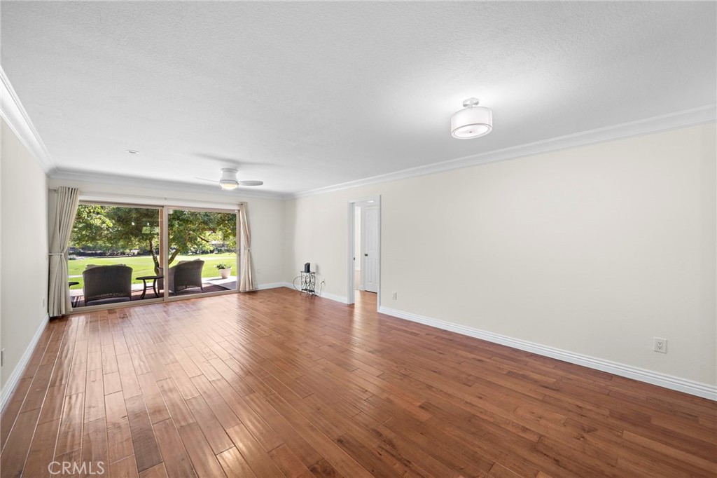 31654 West Nine Drive Laguna Niguel, CA 92677 - Photo 46 of 57 a view of a livingroom with wooden floor and a large window