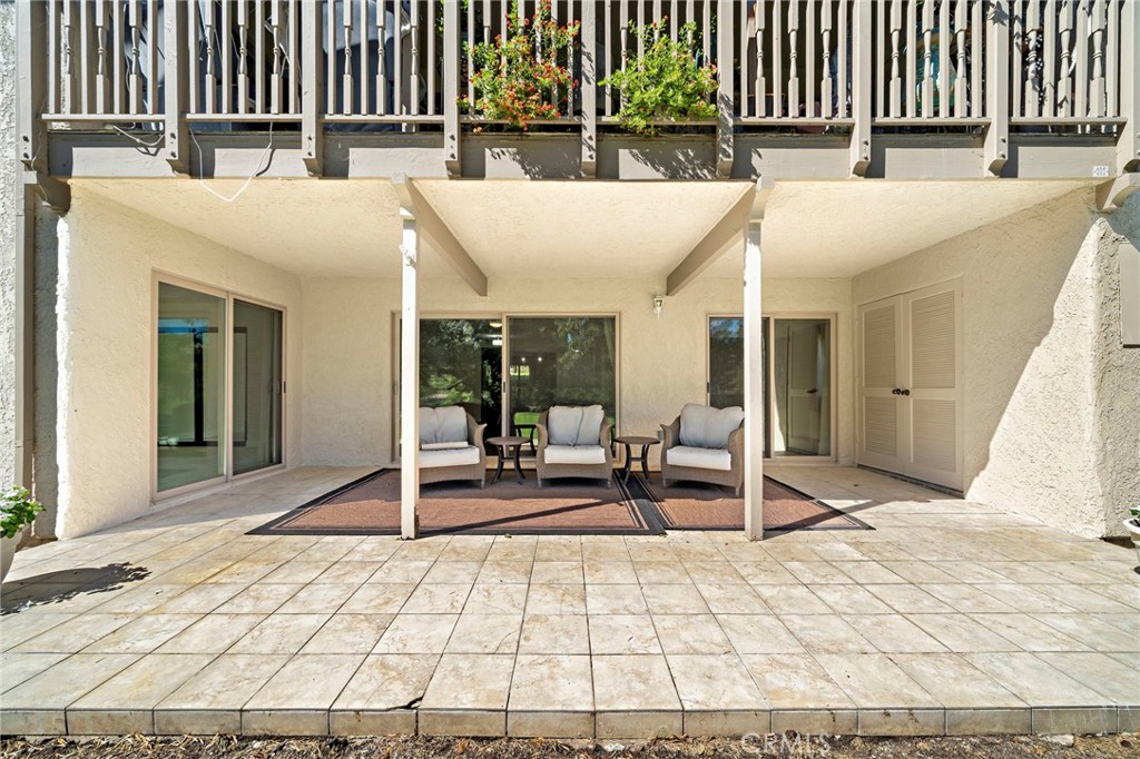 31654 West Nine Drive Laguna Niguel, CA 92677 - Photo 53 of 57 a building outdoor space with patio furniture and potted plants