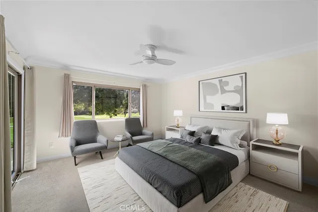 a bedroom with a bed and a couch