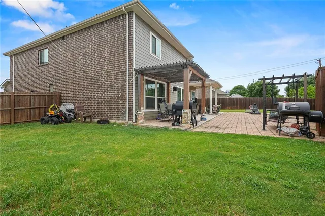 a view of a house with a patio