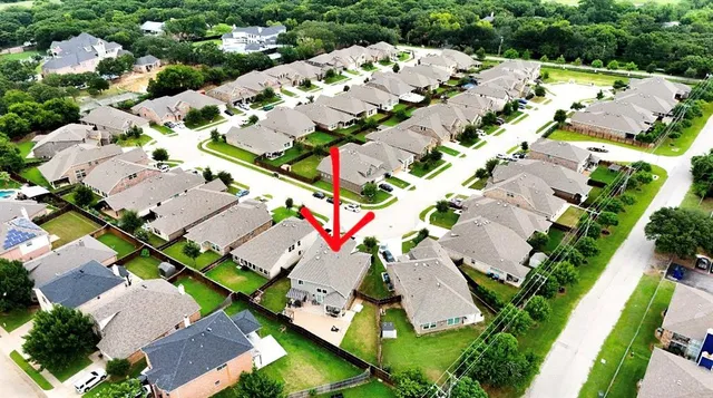 a front view of a house with patio