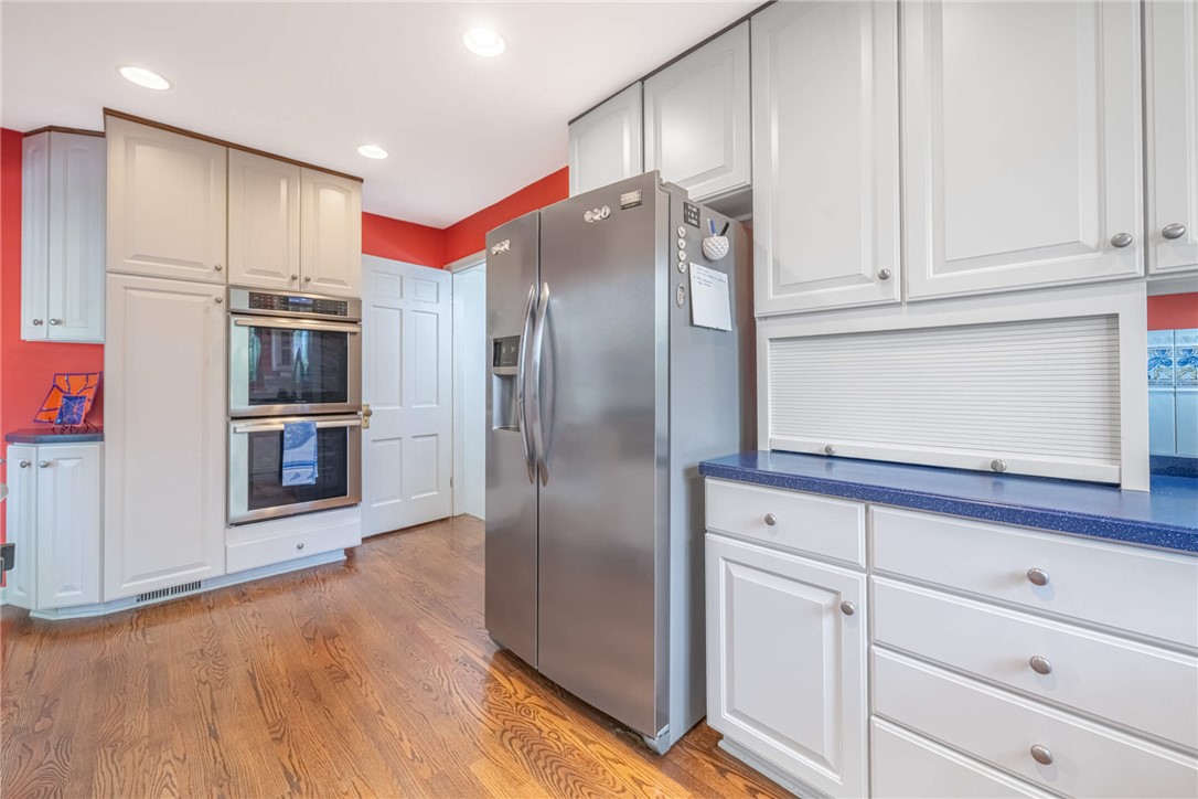156 West Hadley Road Dayton, OH 45419 - Photo 12 of 71 This bright kitchen features ample cabinet space, stainless steel appliances, and rich hardwood flooring.