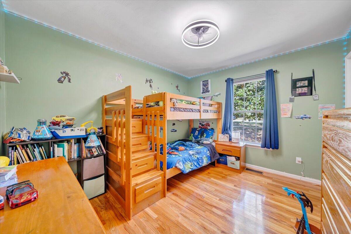 1063 Colony Court Moneta, VA 24121 - Photo 22 of 60 a bed room with furniture and a window