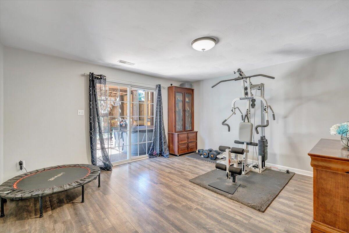 1063 Colony Court Moneta, VA 24121 - Photo 31 of 60 a living room with furniture and a window