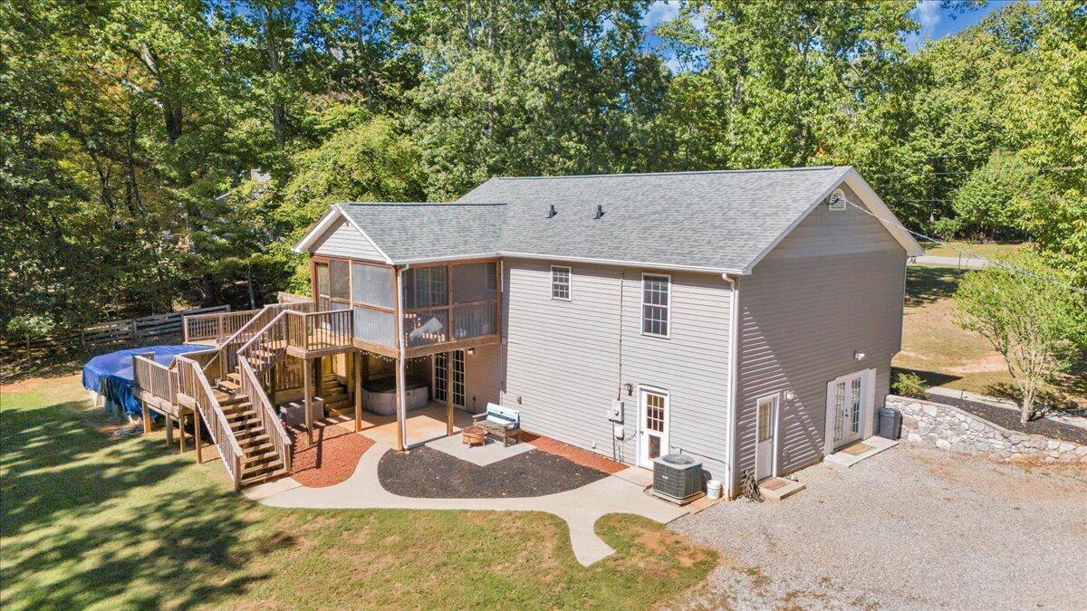 1063 Colony Court Moneta, VA 24121 - Photo 57 of 60 a front view of house with yard seating and green space