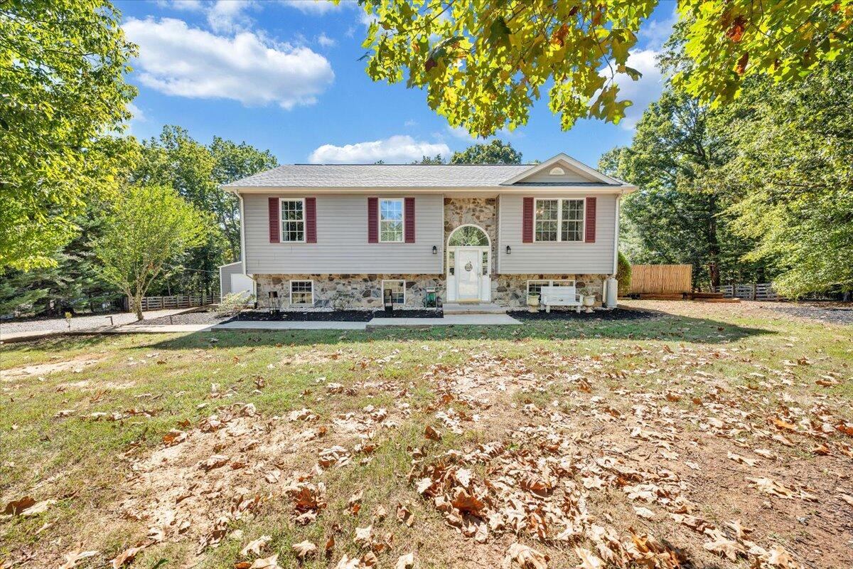 1063 Colony Court Moneta, VA 24121 - Photo 6 of 60 a front view of a house with a yard
