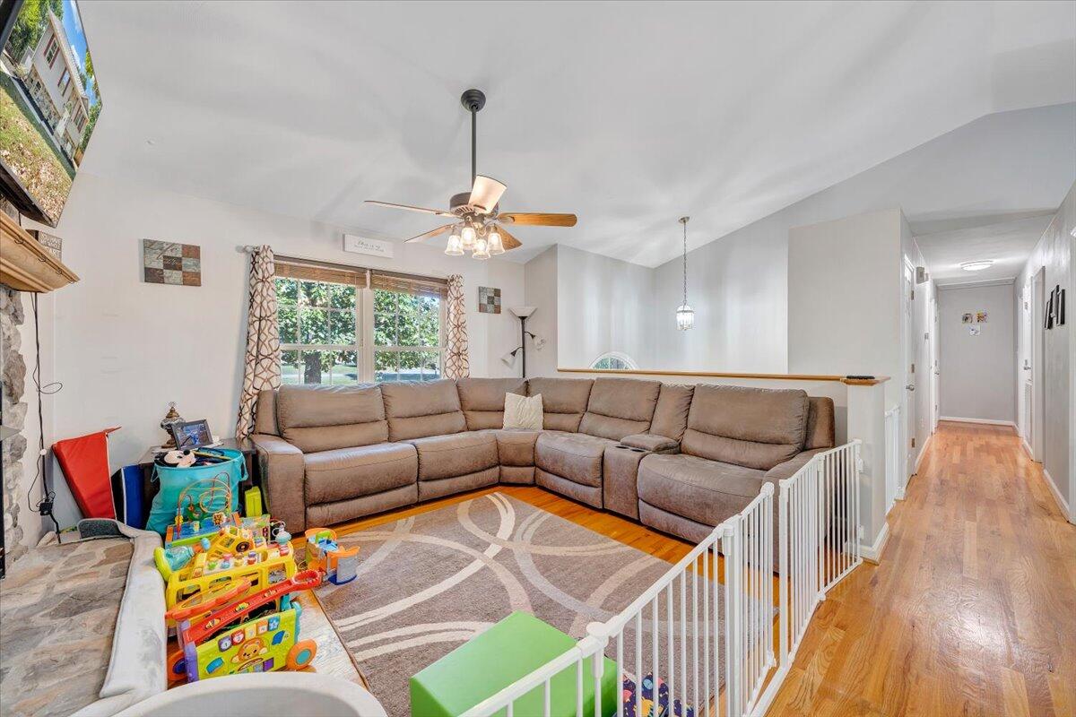 1063 Colony Court Moneta, VA 24121 - Photo 8 of 60 a living room with furniture and a wooden floor
