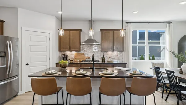a bedroom with furniture and a fireplace