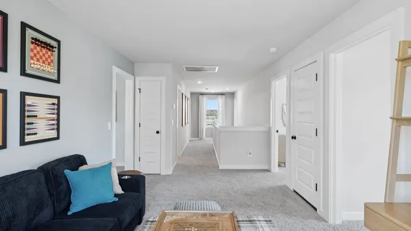 a front view of a building with garden