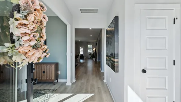 a kitchen with lots of counter top space and stainless steel appliances