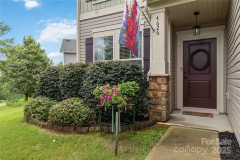 a front view of a house with a porch