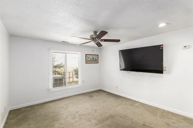 a view of a livingroom with a flat screen tv