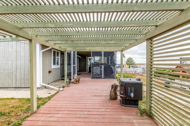 a view of a patio with swimming pool table and chairs