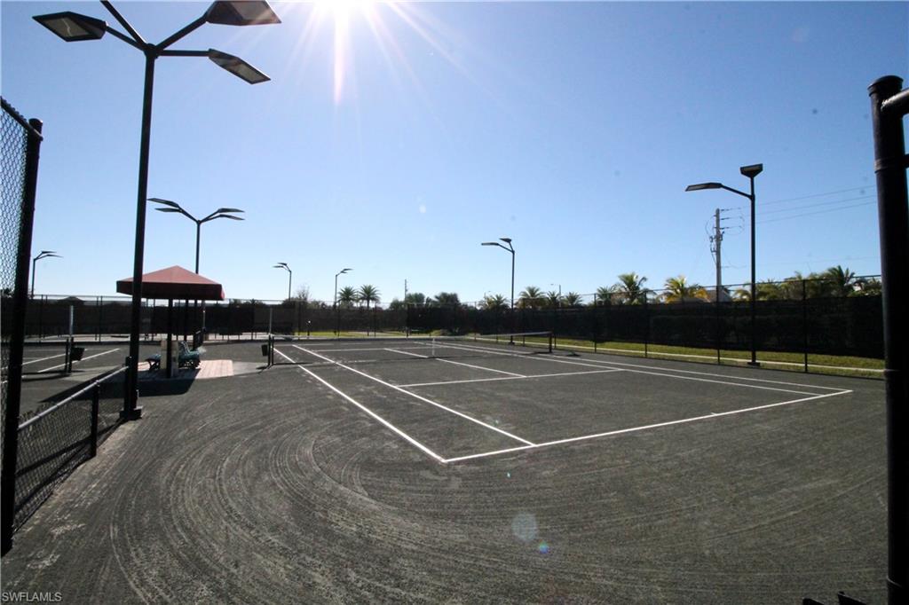 1975 Mustique Street Naples, FL 34120 - Photo 39 of 42 a view of a tennis court