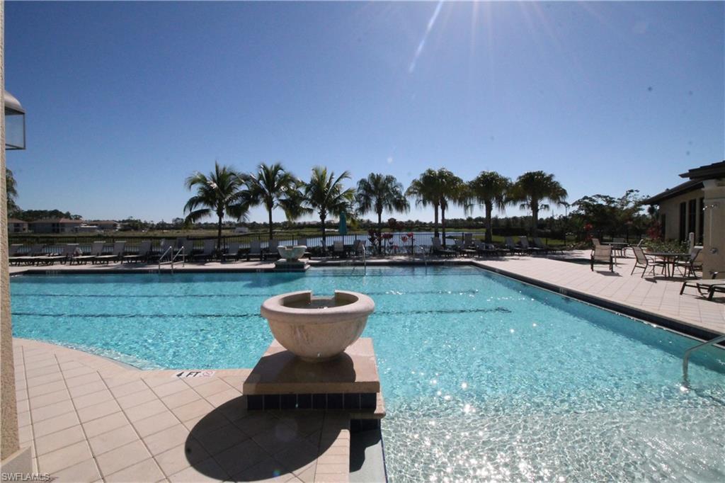 1975 Mustique Street Naples, FL 34120 - Photo 41 of 42 a view of a garden with a slide