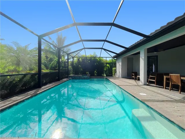 a view of a backyard with patio