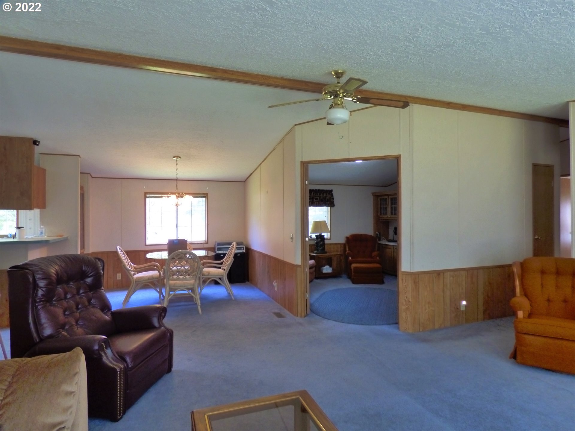 59254 Seven Devils Road Bandon, OR 97411 - Photo 16 of 31 a living room with furniture and a fireplace