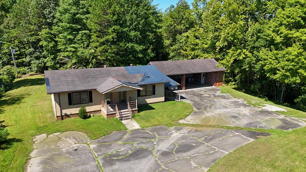 2069 Andrews Road Murphy, NC 28906 - Photo 11 of 12 a front view of a house with garden