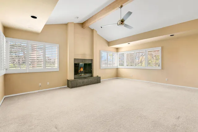 a kitchen with stainless steel appliances granite countertop a stove and a sink