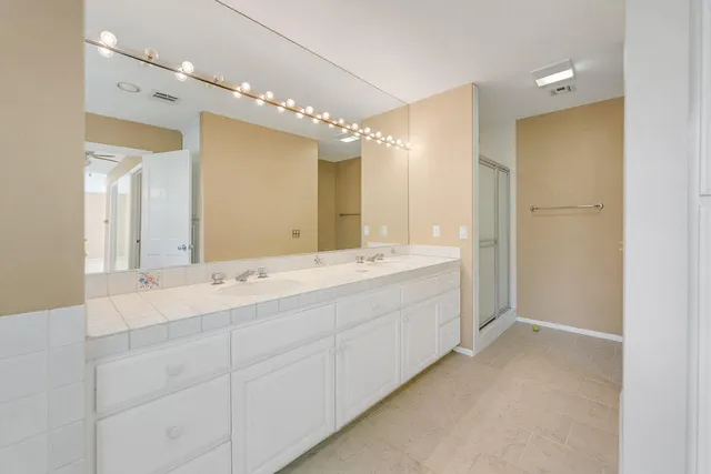 a view of a hallway with closet area