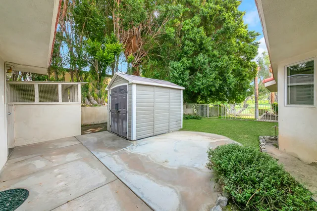 a view of outdoor space yard deck and swimming pool