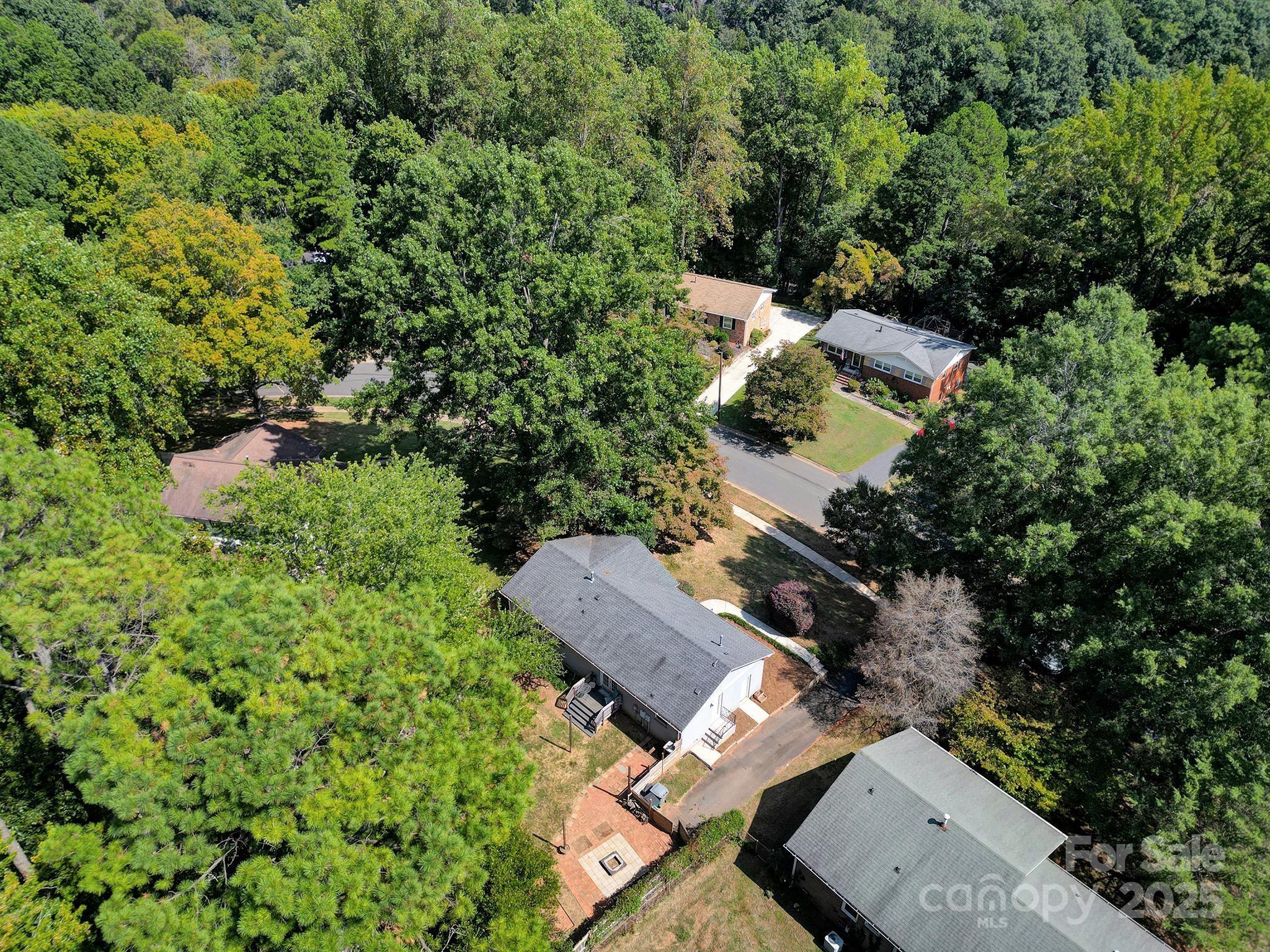 7424 Watercrest Road Charlotte, NC 28210 - Photo 32 of 32 an aerial view of house with yard swimming pool and outdoor seating