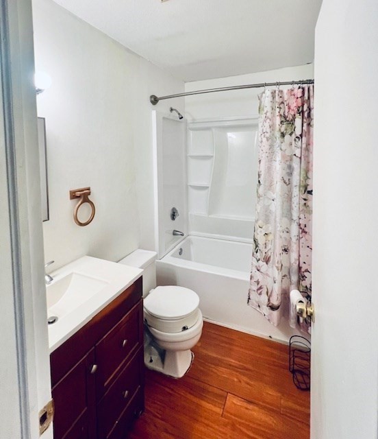 549 Russell Road, Unit 14D Westfield, MA 01085 - Photo 10 of 15 a bathroom with a sink a toilet a mirror a bathtub and shower
