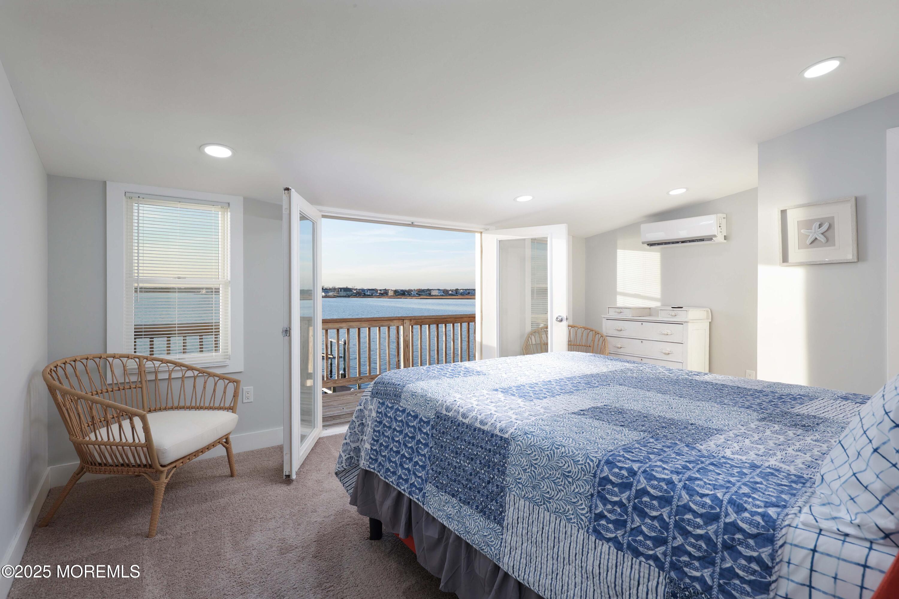 151 Shore Drive Brick, NJ 08723 - Photo 17 of 40 a bedroom with a bed and a couch