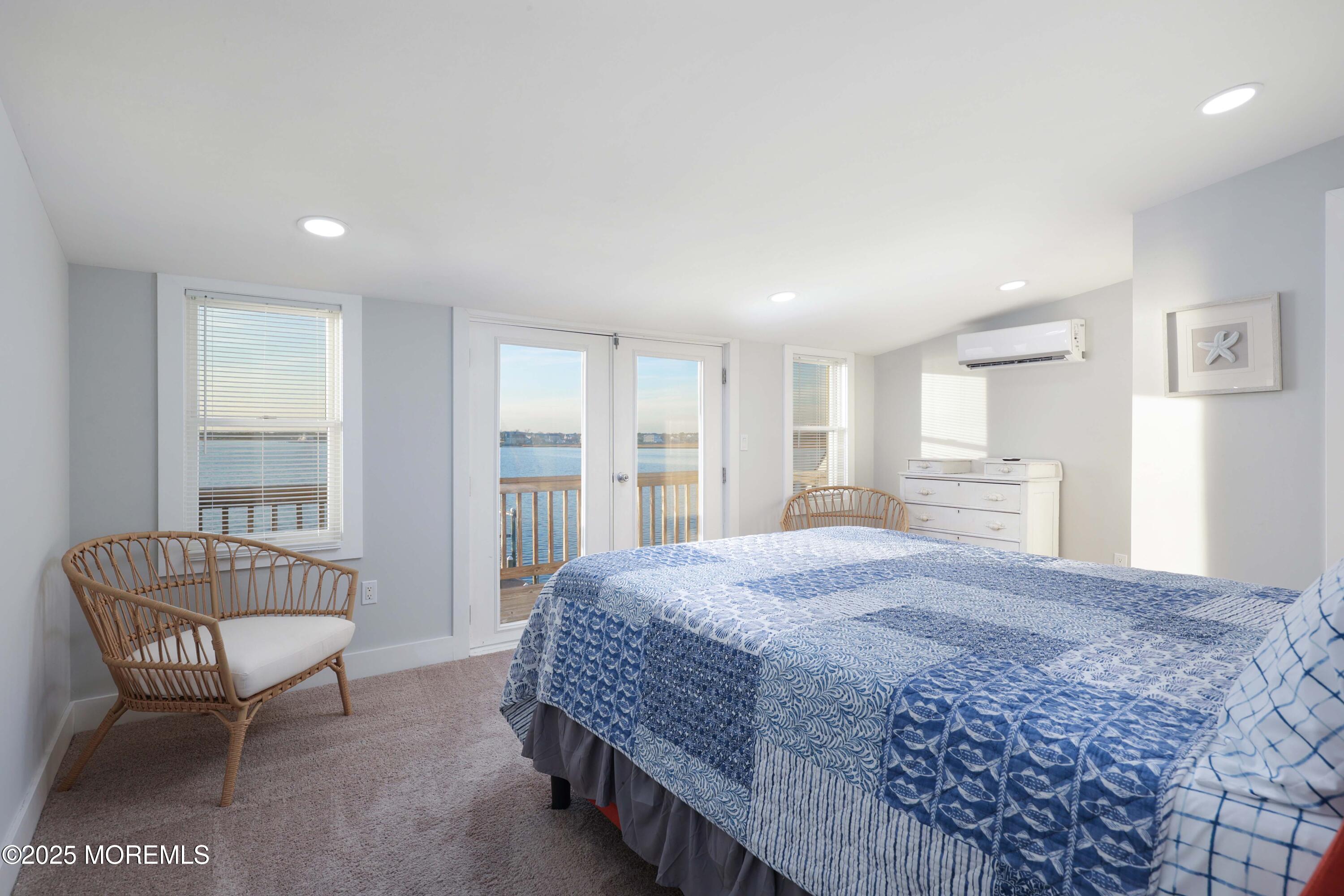 151 Shore Drive Brick, NJ 08723 - Photo 18 of 40 a bedroom with a bed and a couch