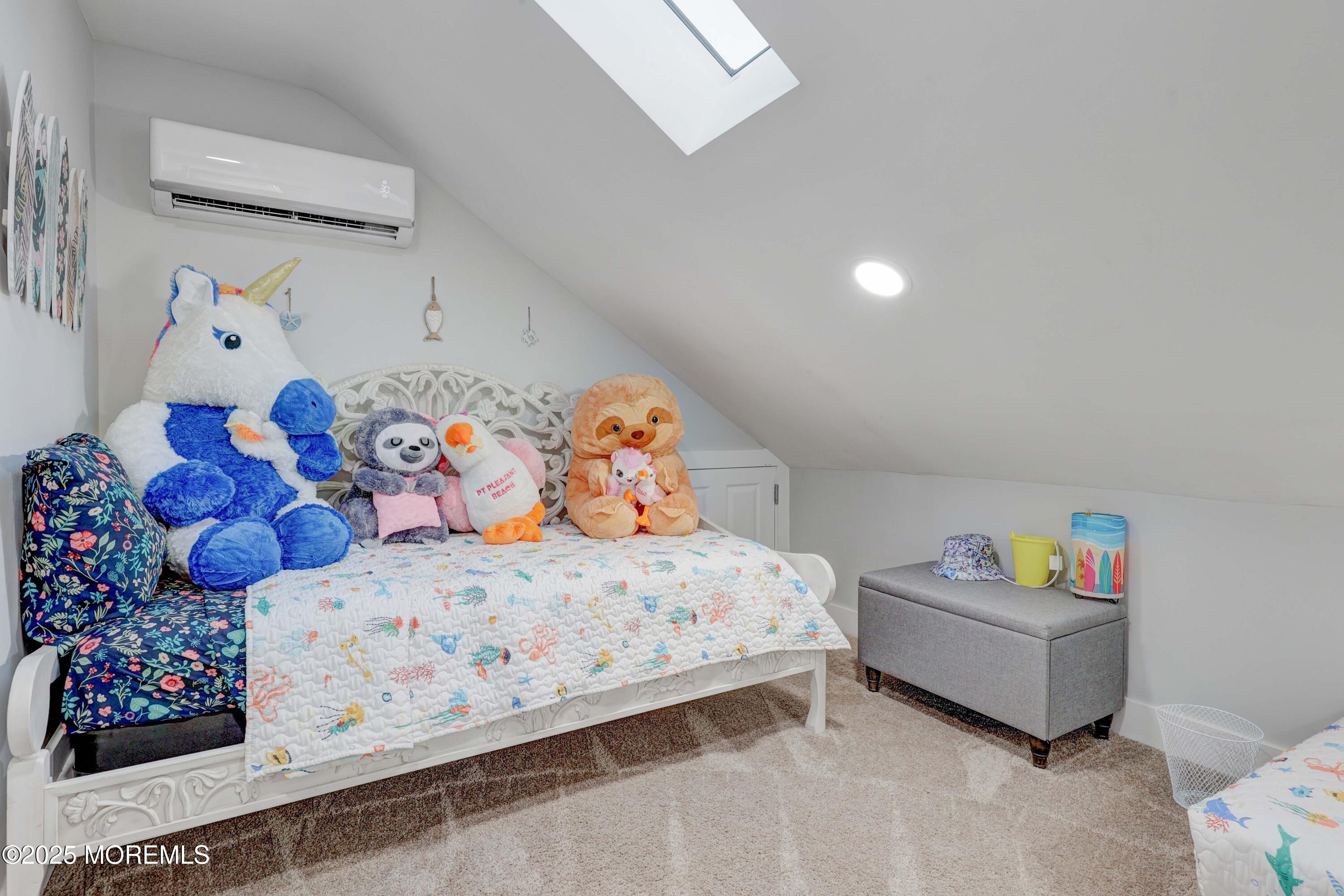 151 Shore Drive Brick, NJ 08723 - Photo 24 of 40 a bedroom with a bed and a window