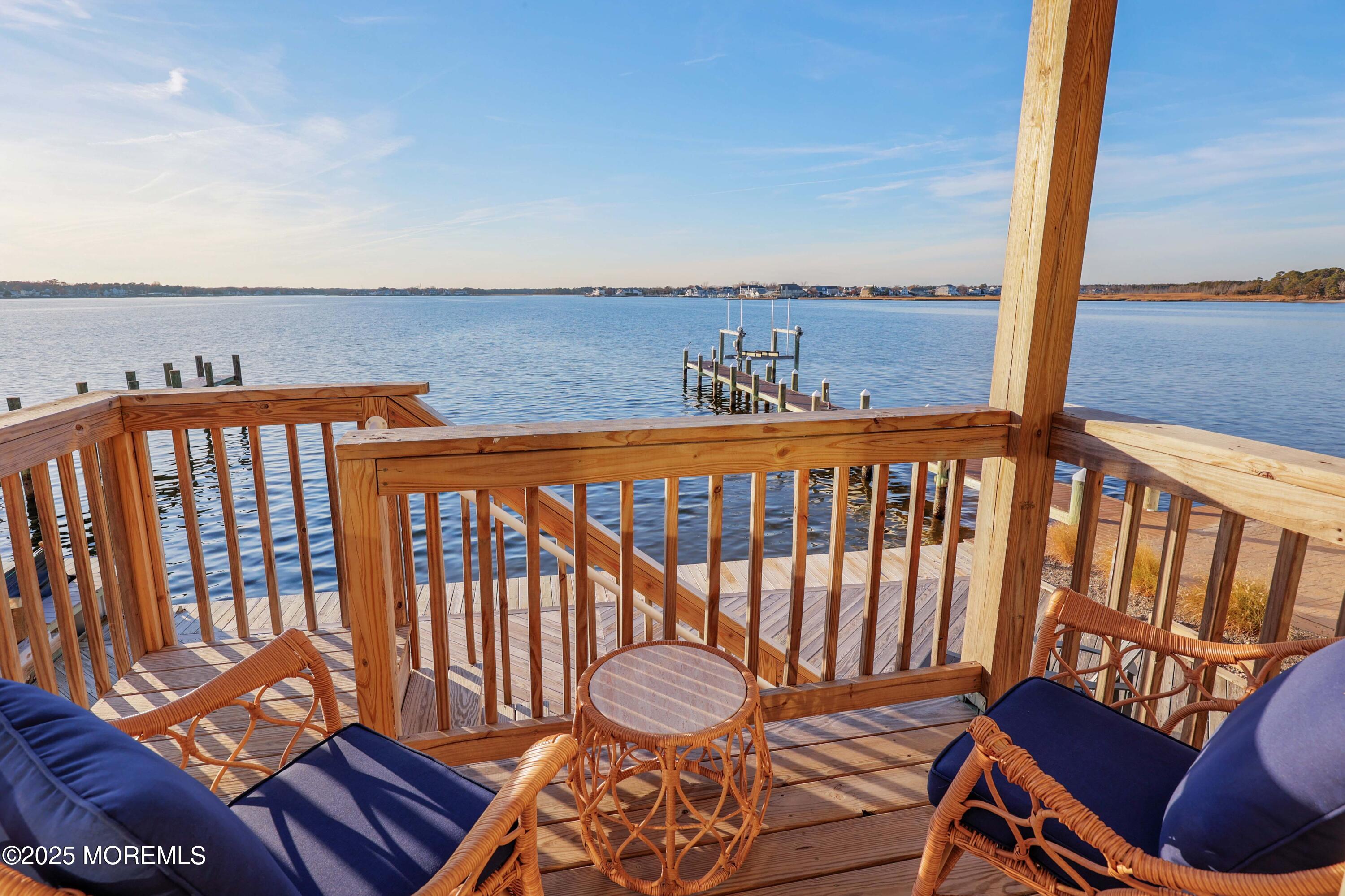 151 Shore Drive Brick, NJ 08723 - Photo 26 of 40 a view of a chairs and table in the balcony