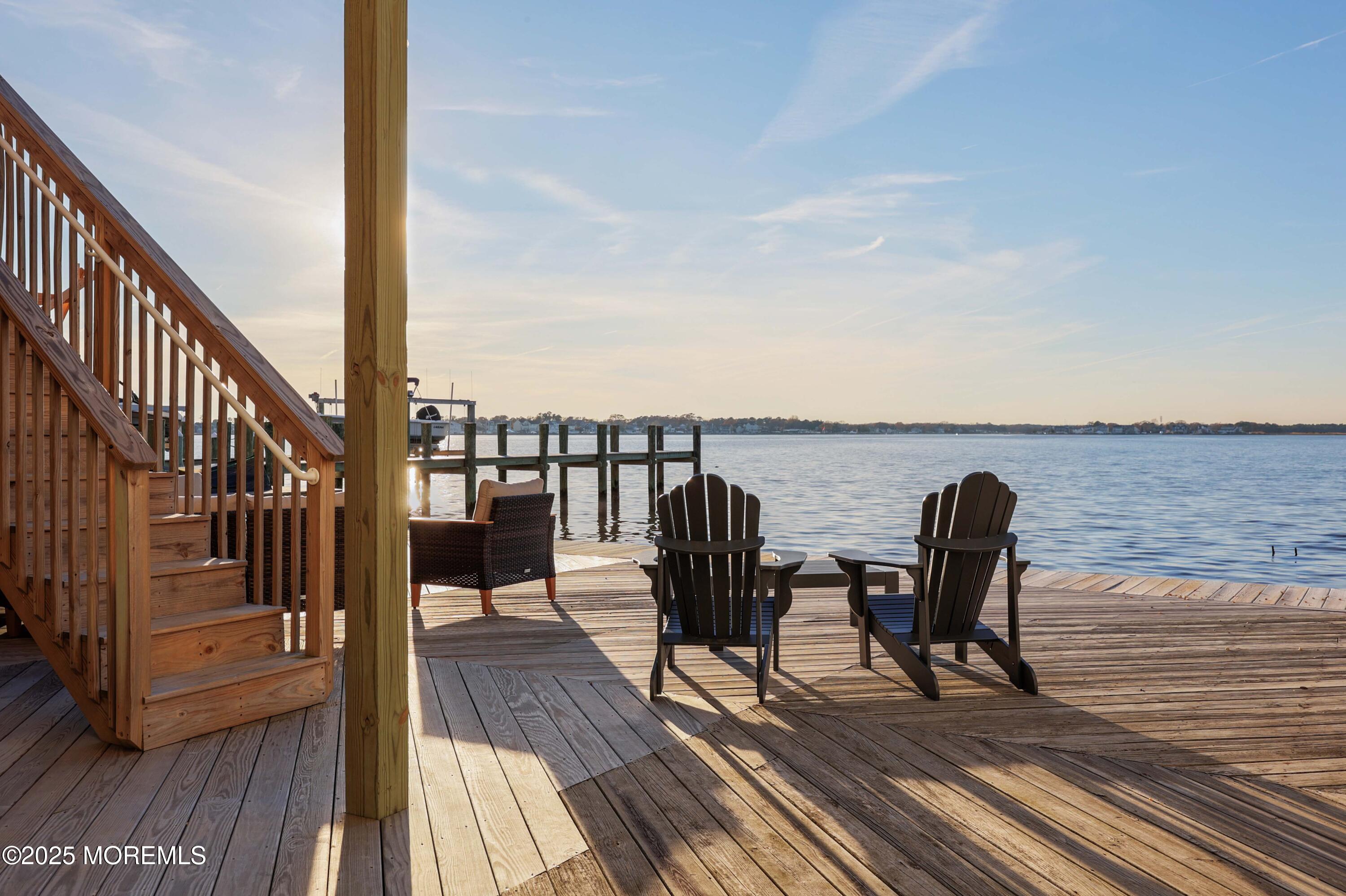 151 Shore Drive Brick, NJ 08723 - Photo 27 of 40 a view of a chairs on the deck