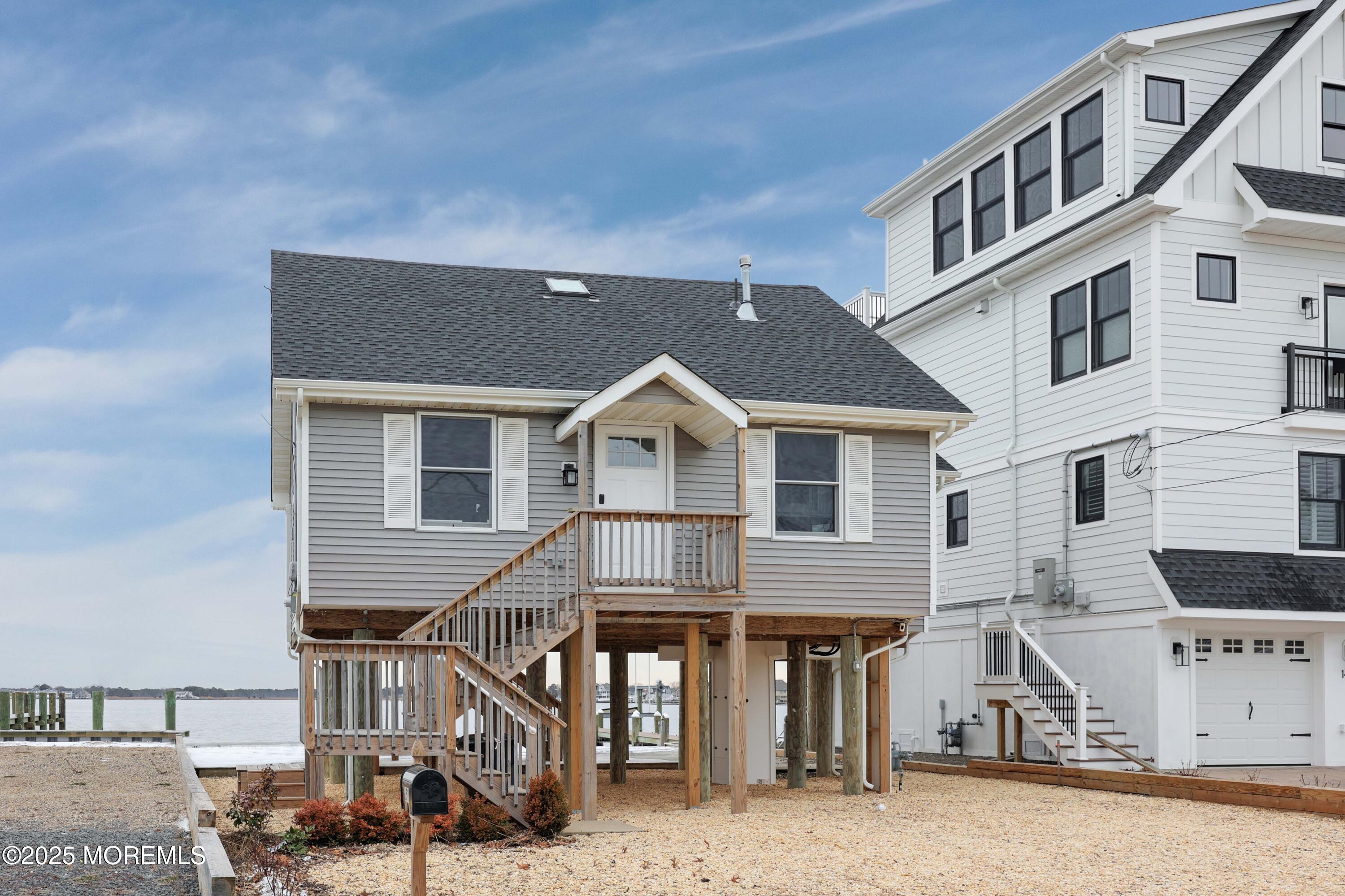 151 Shore Drive Brick, NJ 08723 - Photo 37 of 40 a front view of a house with a yard