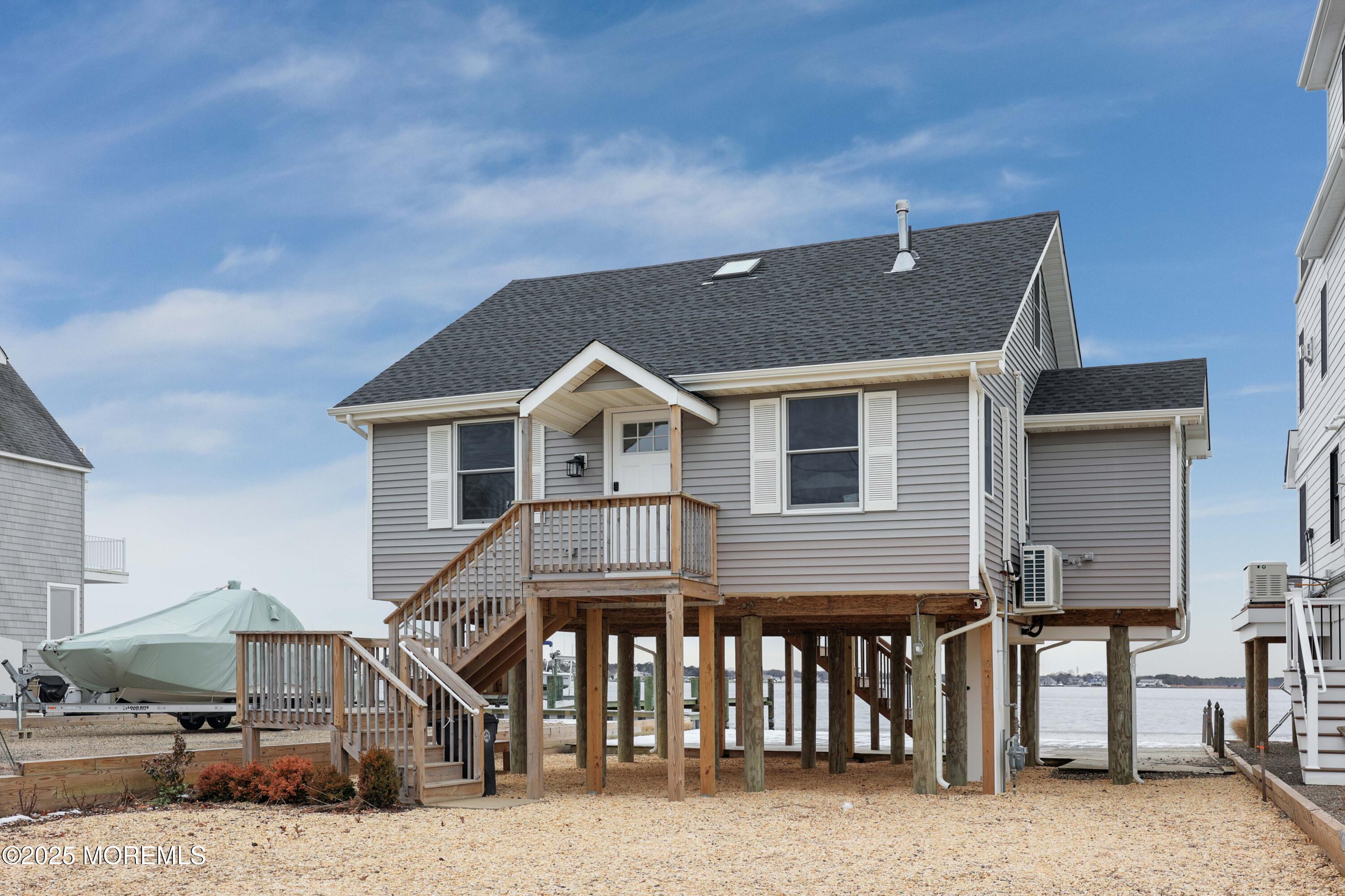 151 Shore Drive Brick, NJ 08723 - Photo 38 of 40 a view of house with a street