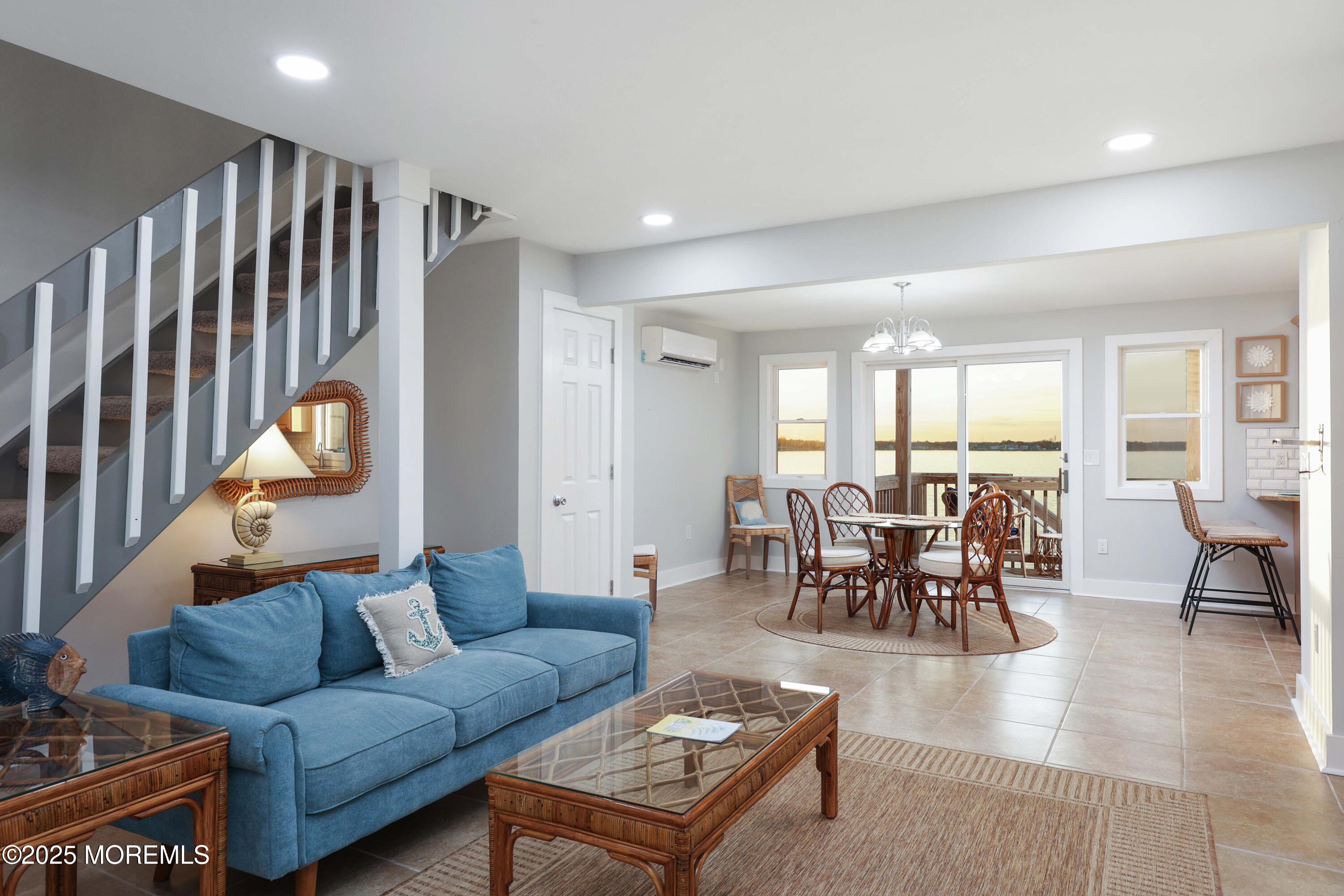 151 Shore Drive Brick, NJ 08723 - Photo 8 of 40 a living room with furniture and wooden floor