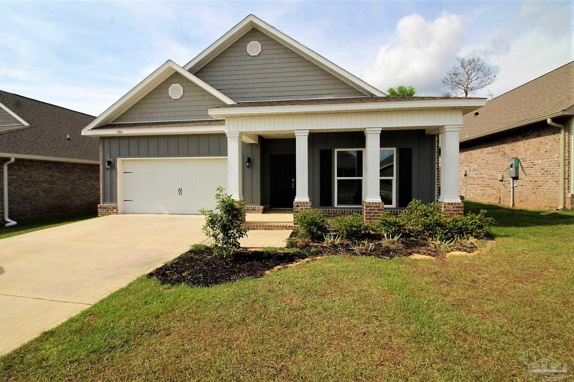 8006 Burnside Loop Pensacola, FL 32526 - Photo 1 of 22 front view of a house with a yard