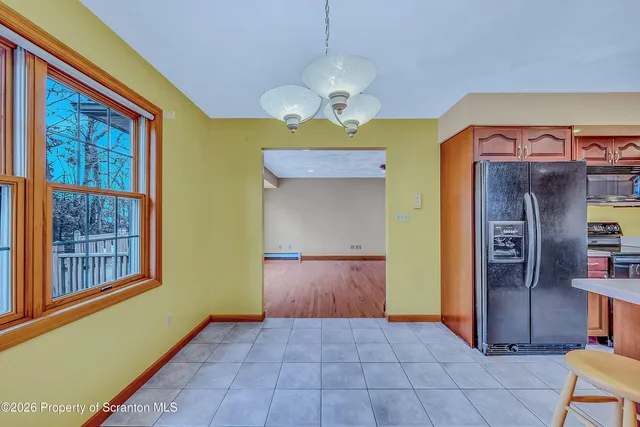 a view of an entryway with a chandelier