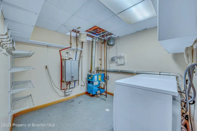 a view of a storage & utility room with washer and dryer